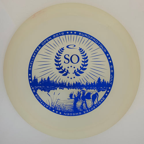 Latitude 64 Opto Moonshine Explorer - 18 Skellektea Open stamp